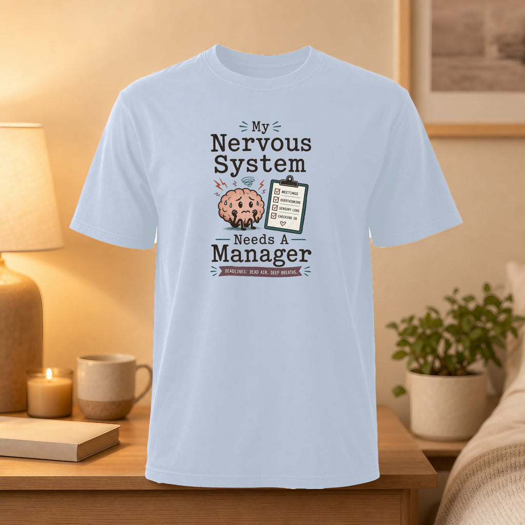 Light blue t-shirt with "My Nervous System Needs A Manager" text and icons.
