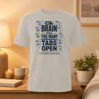 White t-shirt with "My brain has too many tabs open" graphic.