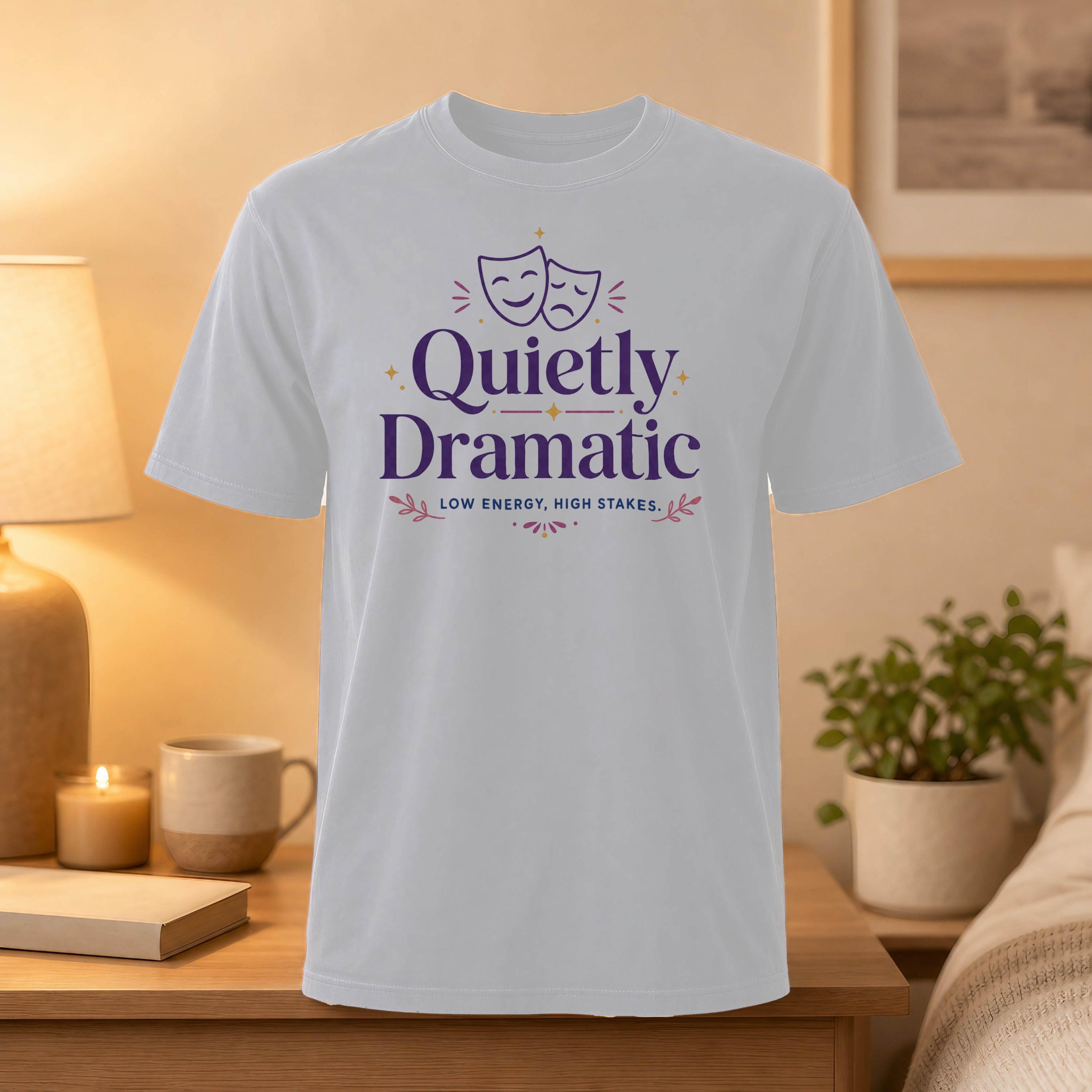 White t-shirt with "Quietly Dramatic" text and theater masks.