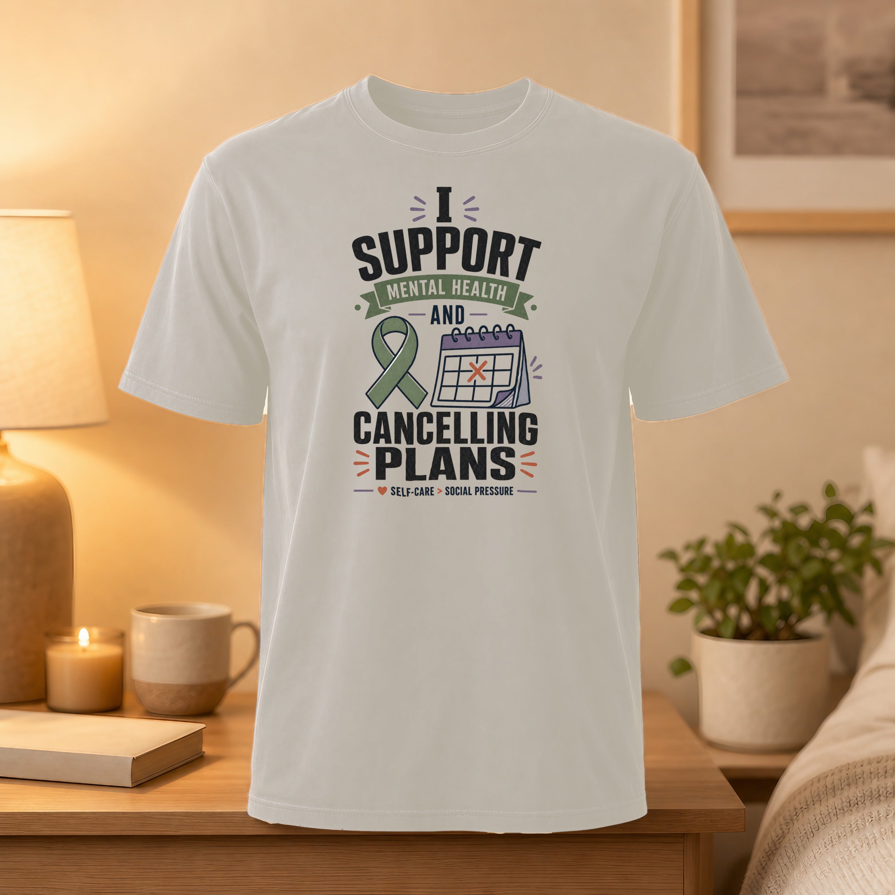 T-shirt with text "I Support Mental Health and Cancelling Plans" and a green ribbon.