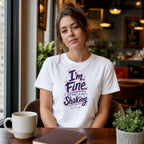 Woman wearing white t-shirt with "I'm fine, the font is just shaking" text.