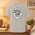 T-shirt with "Tiny Social Battery" and stars in a circular logo.
