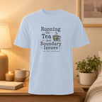 Light blue t-shirt with "Running On Tea And Boundary Issues" text and teacup graphic.