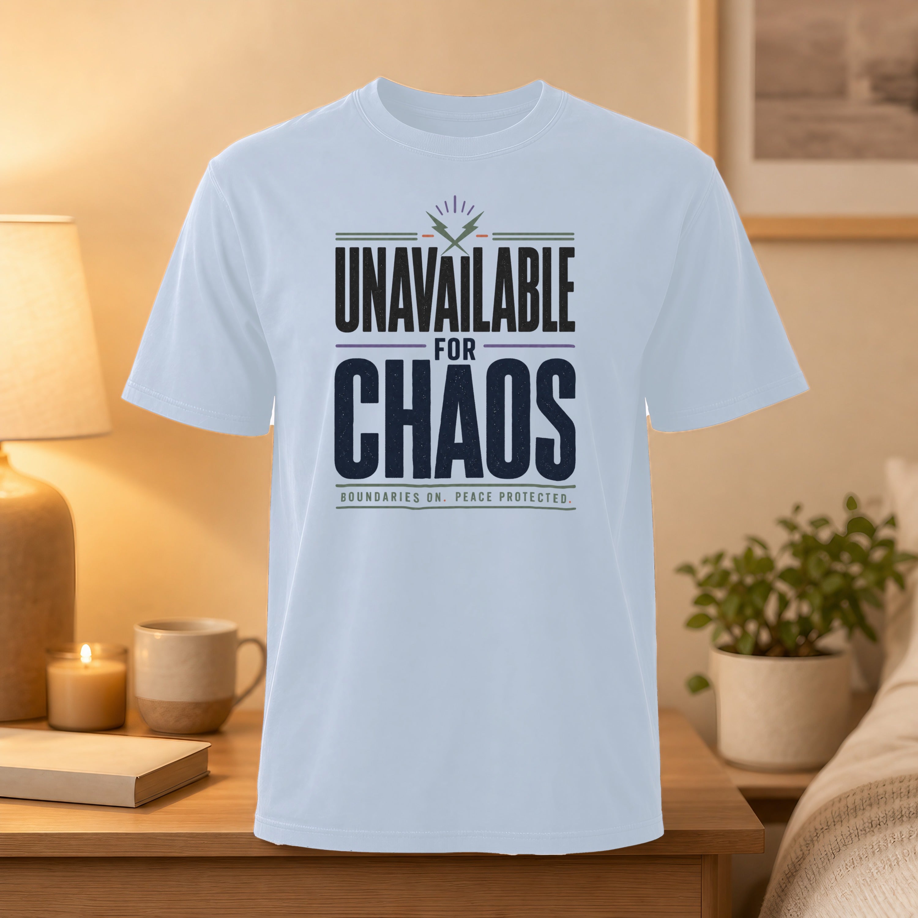 White t-shirt with "UNAVAILABLE FOR CHAOS" and "BOUNDARIES. PEACE. PROTECTED." text.