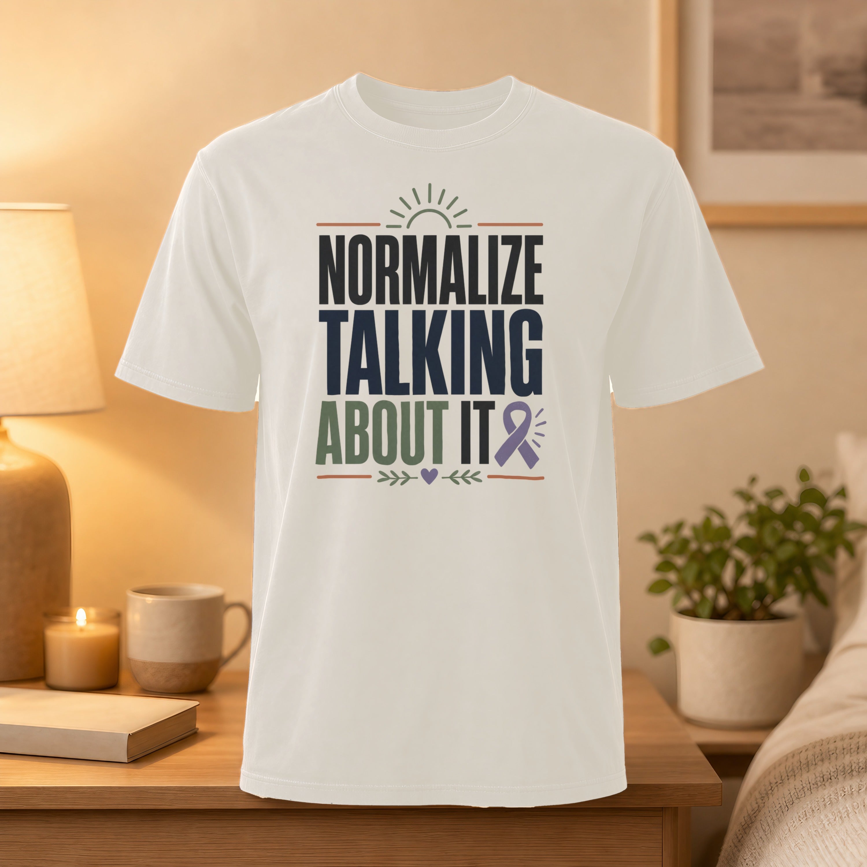 White t-shirt with "Normalize Talking About It" text and purple ribbon.