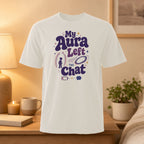 White t-shirt with "My Aura Left the Chat" text and graphics.