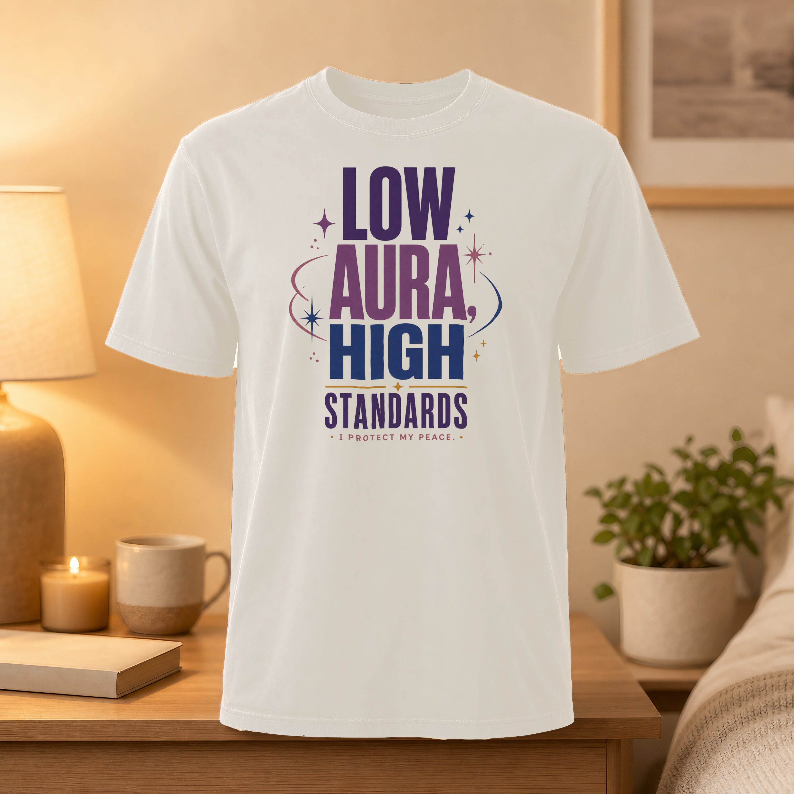 White t-shirt with "LOW AURA HIGH STANDARDS" and "I PROTECT MY PEACE" text.
