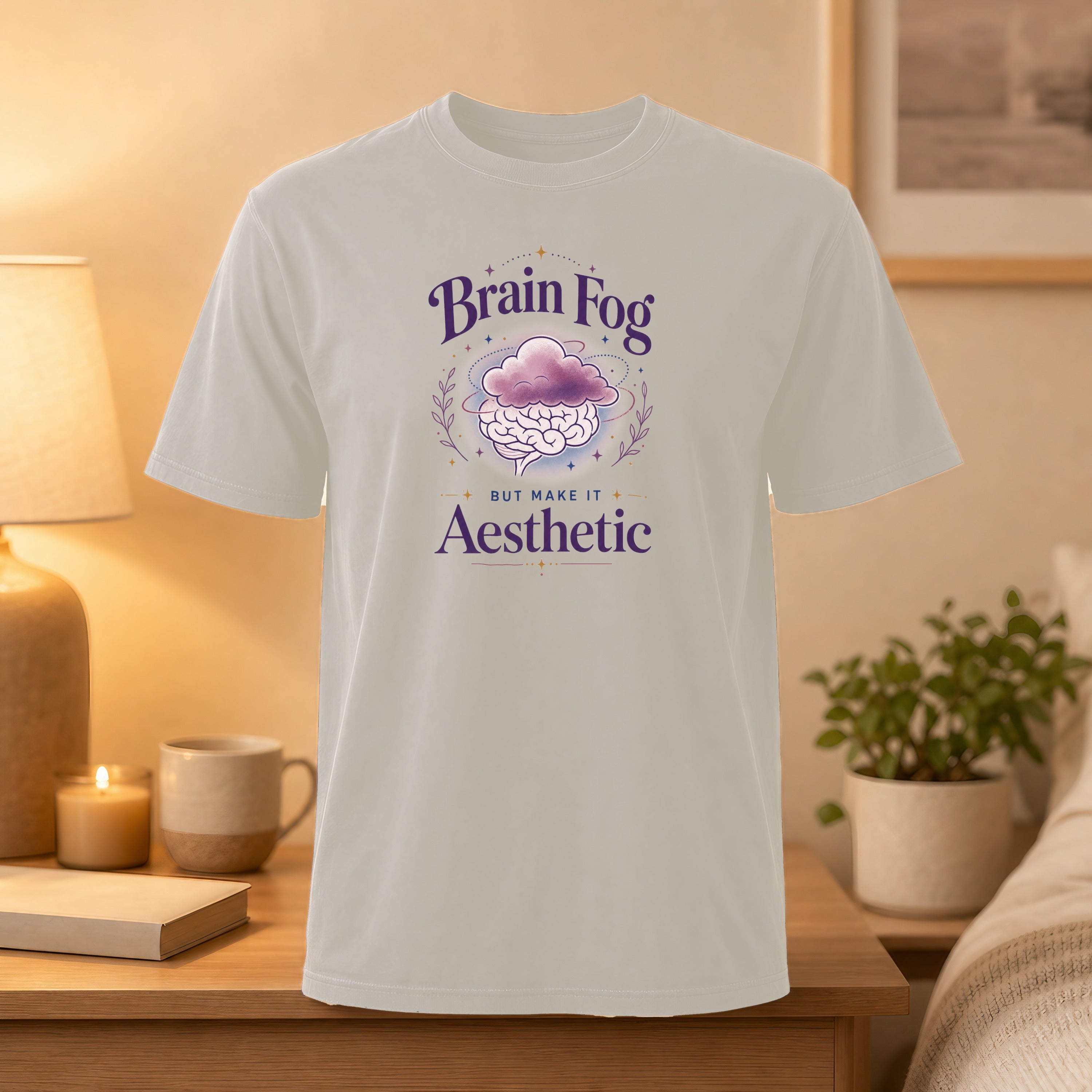 Light gray t-shirt with "Brain Fog But Make It Aesthetic" text and cloud design.
