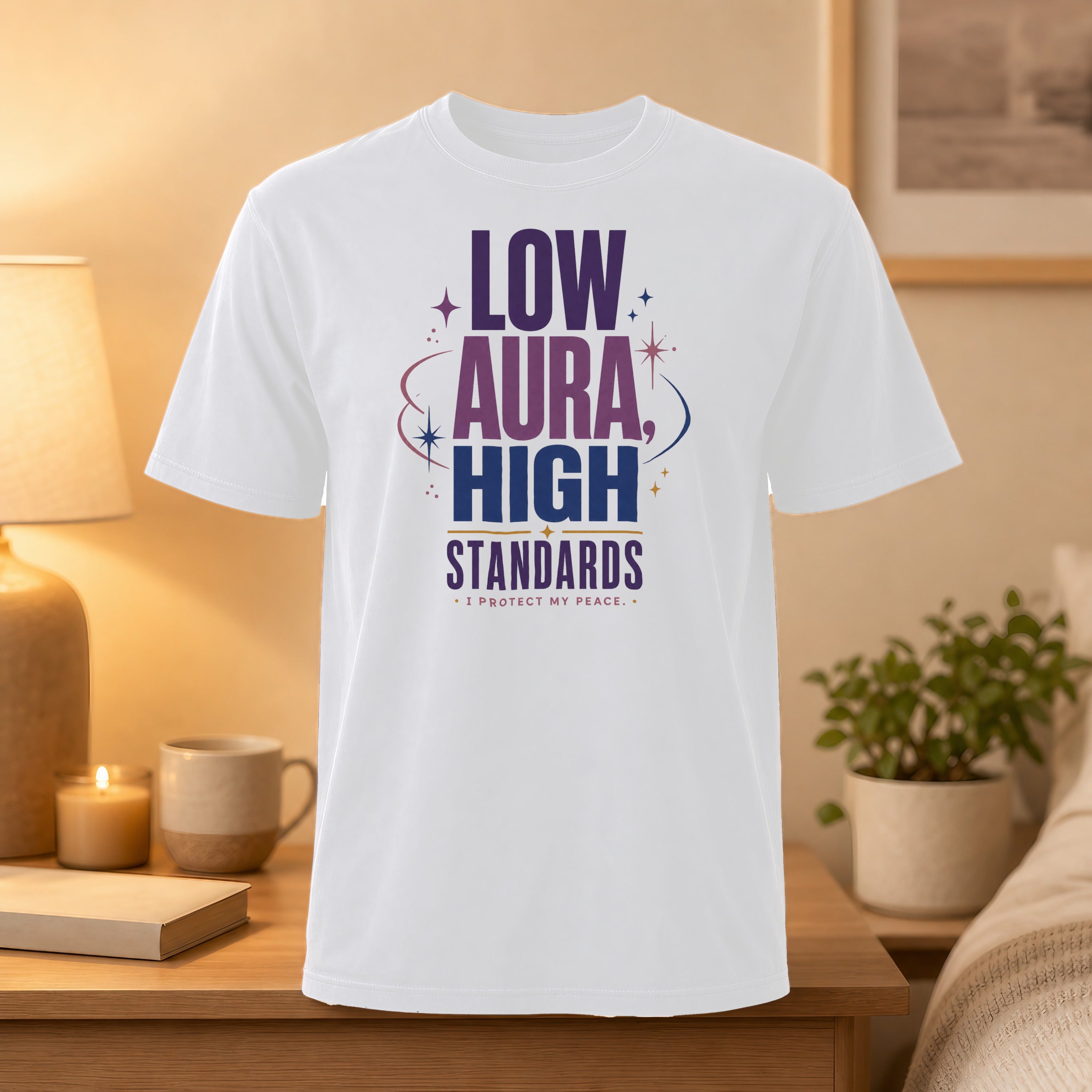 White t-shirt with "LOW AURA HIGH STANDARDS I PROTECT MY PEACE" text.