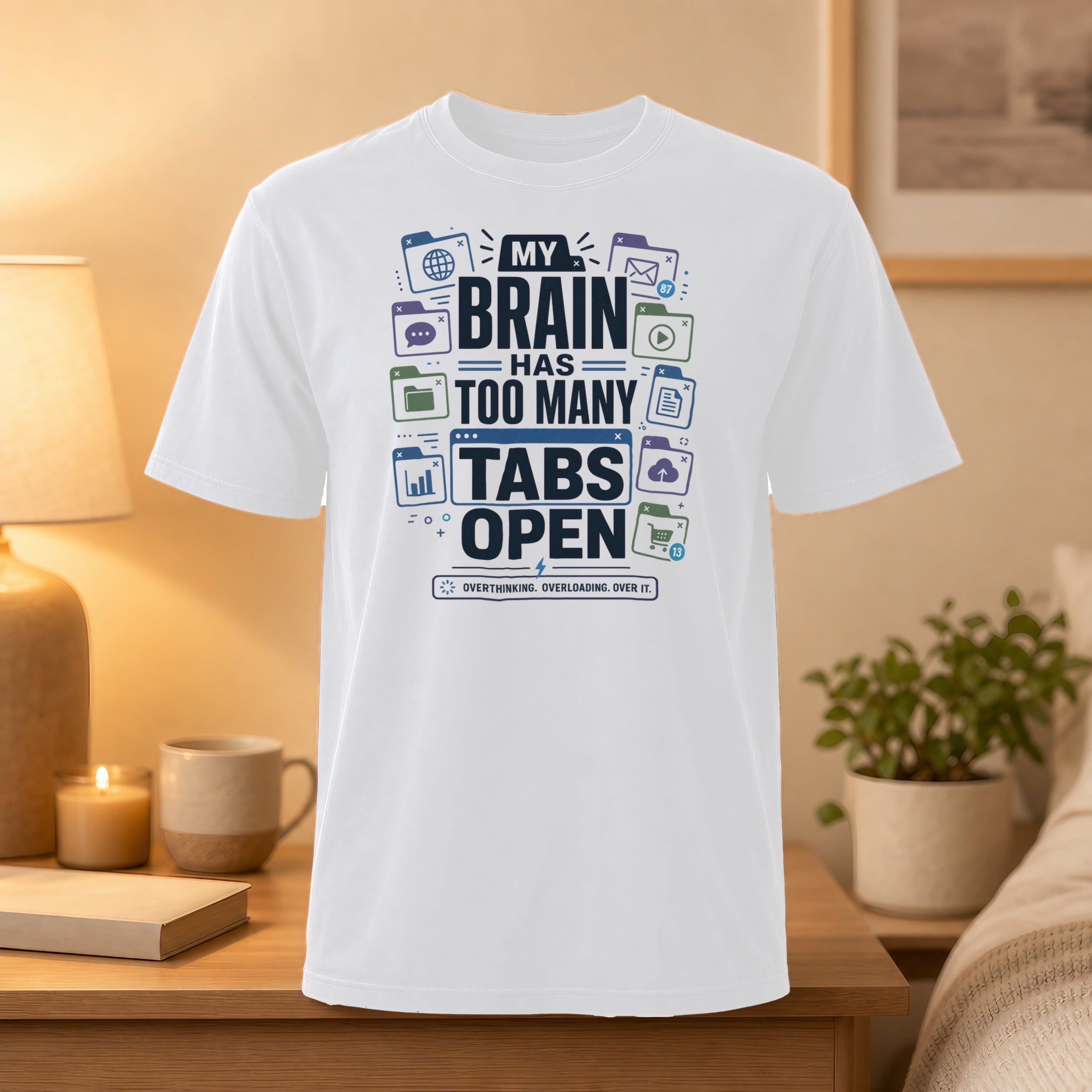 White t-shirt with "My brain has too many tabs open" graphic.