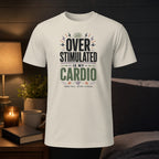 White t-shirt with "OVER STIMULATED IS MY CARDIO" text.