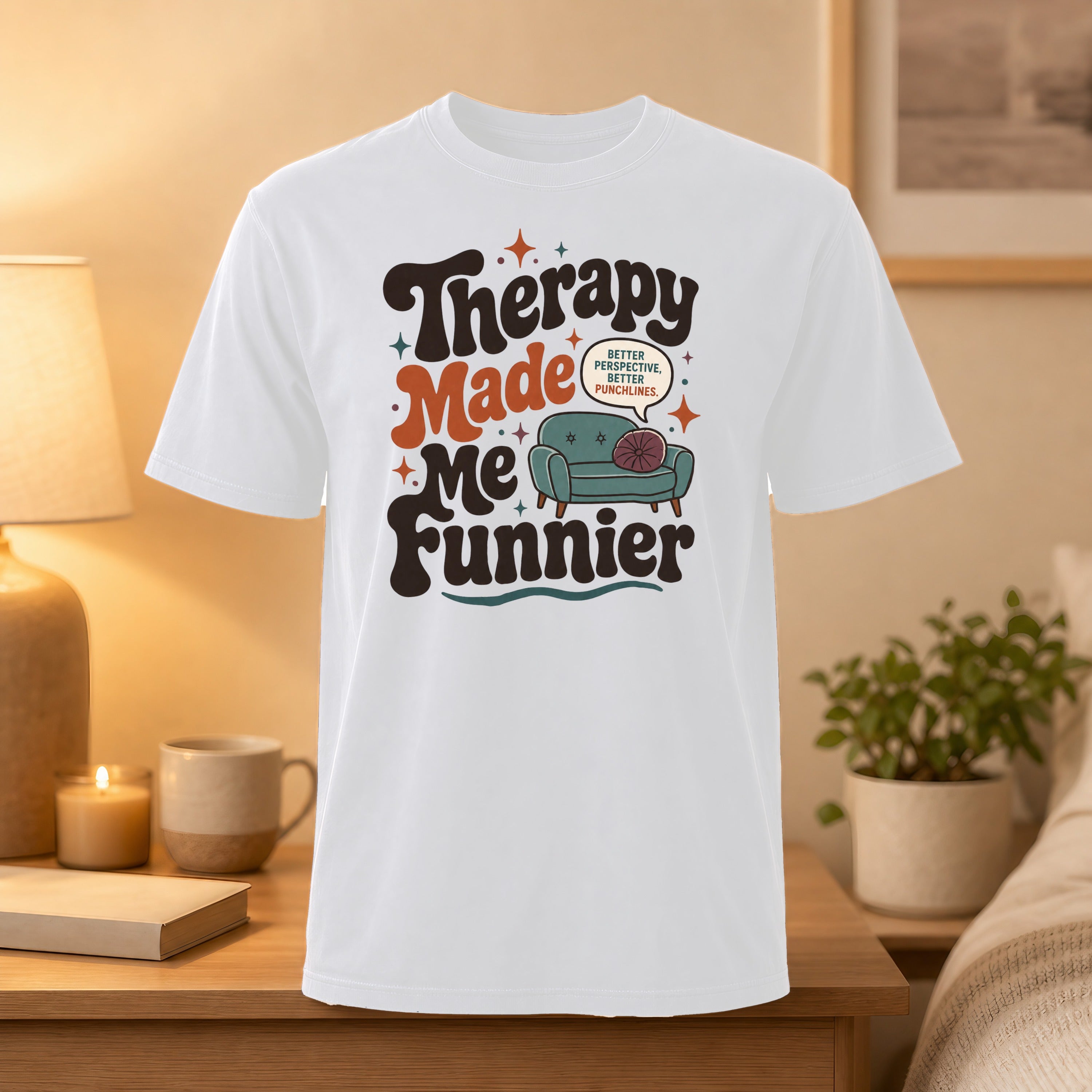 White t-shirt with "Therapy Made Me Funnier" text and couch graphic.