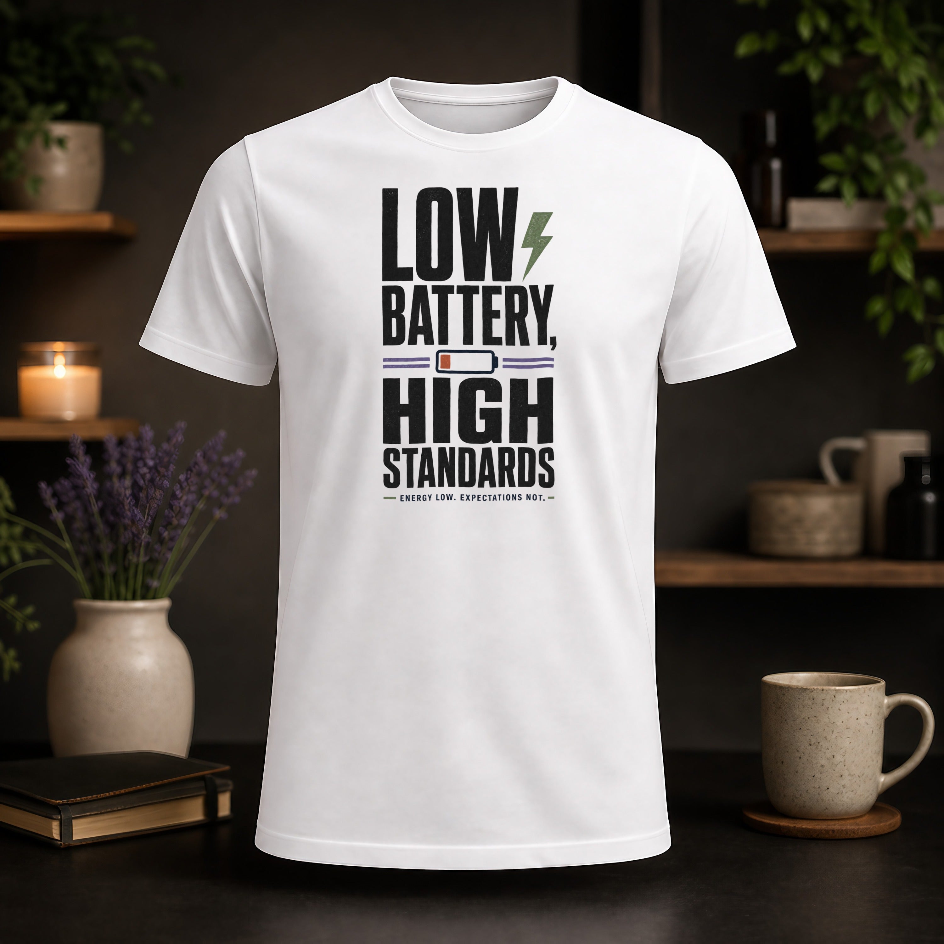White t-shirt with "Low Battery, High Energy" text and battery icon.