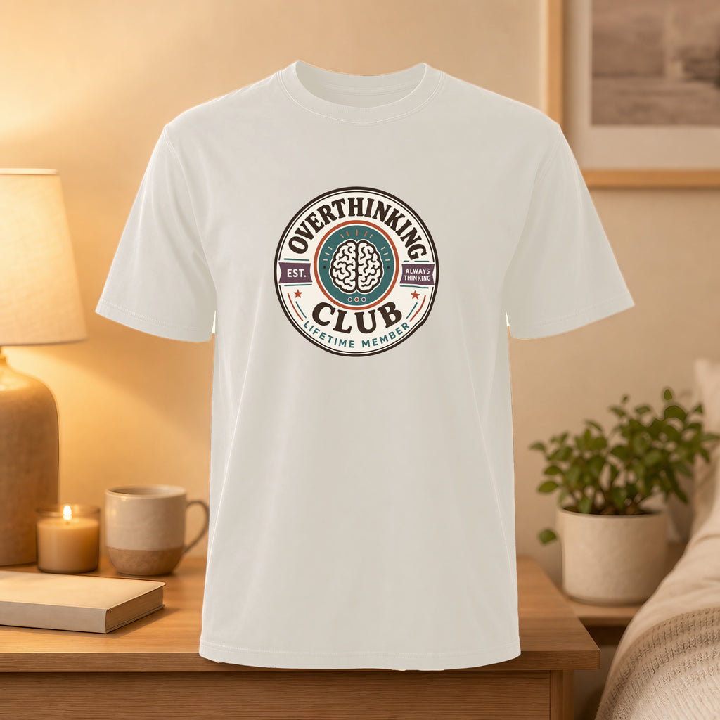 White t-shirt with "Overthinking Lifetime Member" circular logo and brain graphic.