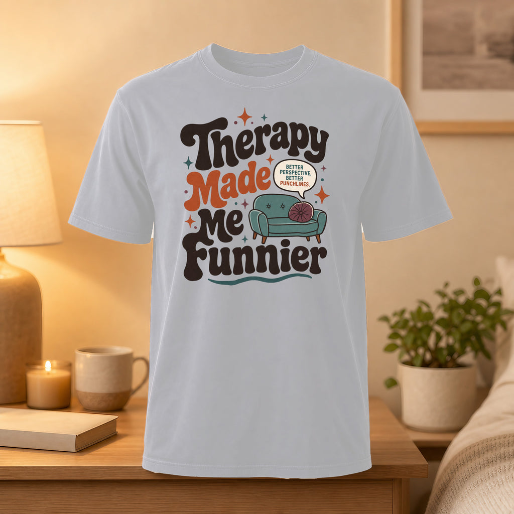 White t-shirt with "Therapy Made Me Funnier" text and sofa icon.