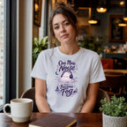 Woman in white t-shirt with "One More Noise and I Become Fog" graphic.