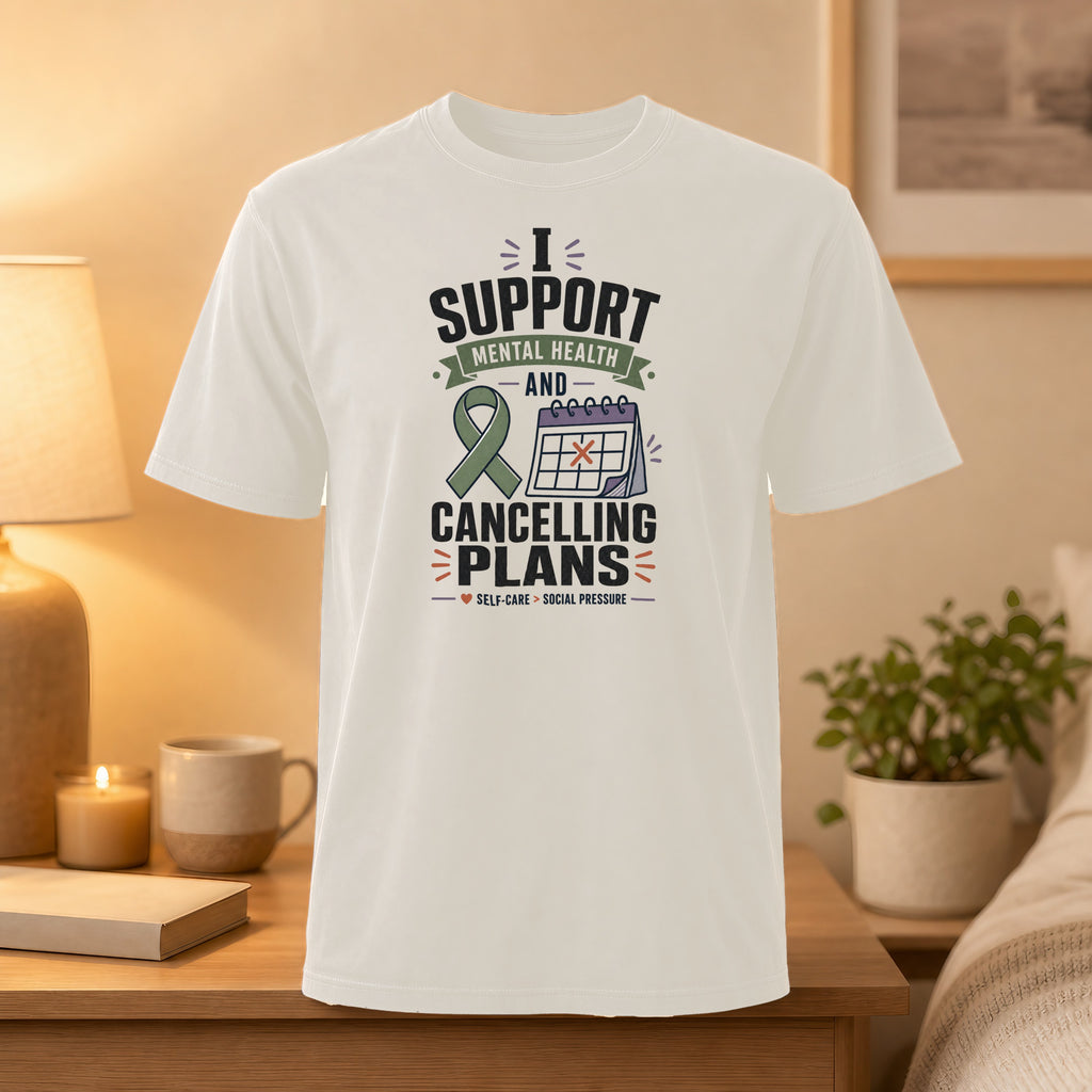 White t-shirt with "Support Mental Health and Cancelling Plans" text and ribbon.
