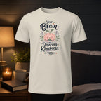 Cream t-shirt with "Your Brain Deserves Kindness Too" text and brain graphic.