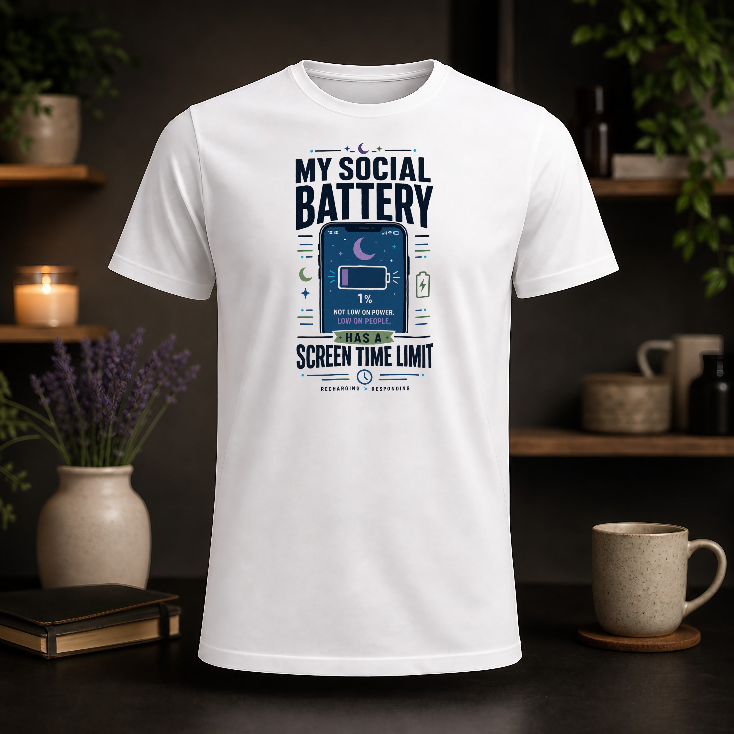 White t-shirt with text: "My Social Battery 1% Not low on power. Low on people. Has a screen time limit."
