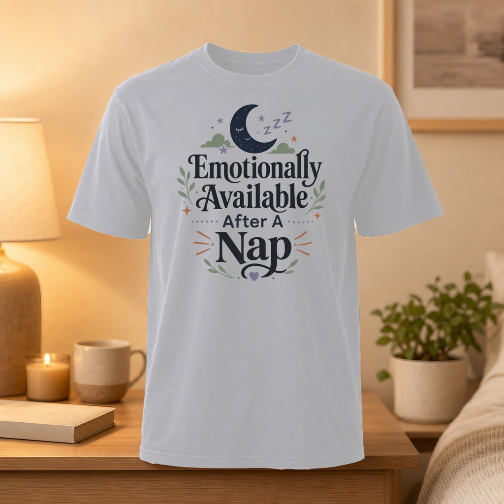 White t-shirt with "Emotionally Available After A Nap" text and moon graphic.