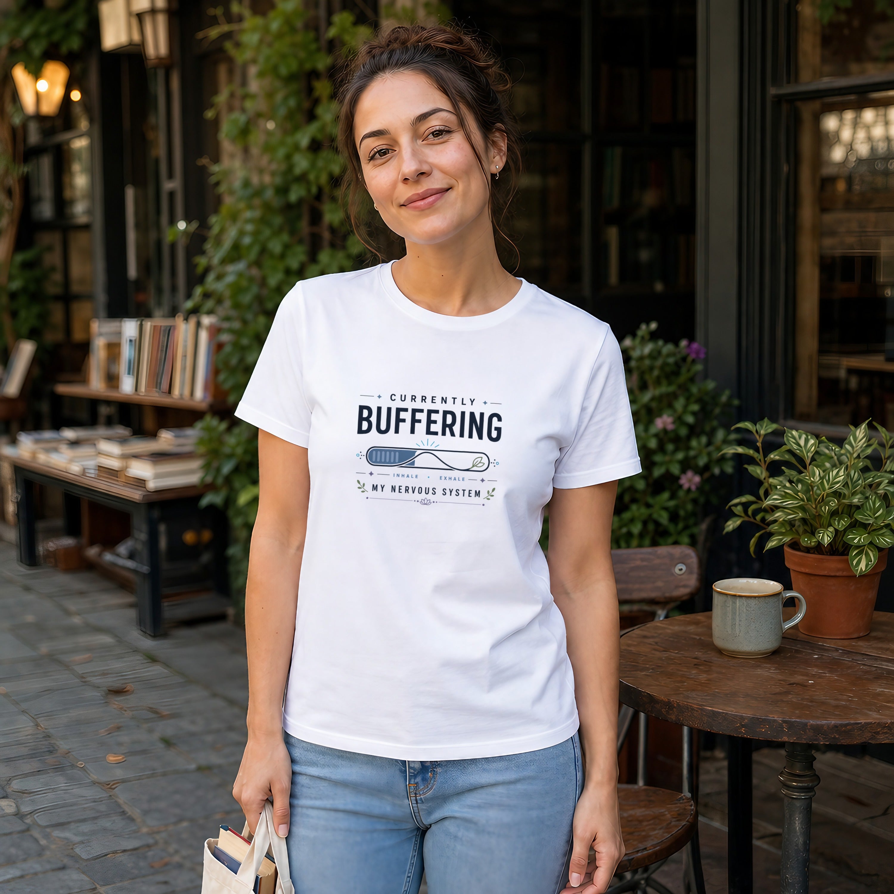 Woman wearing a white t-shirt with "Currently Buffering" text.