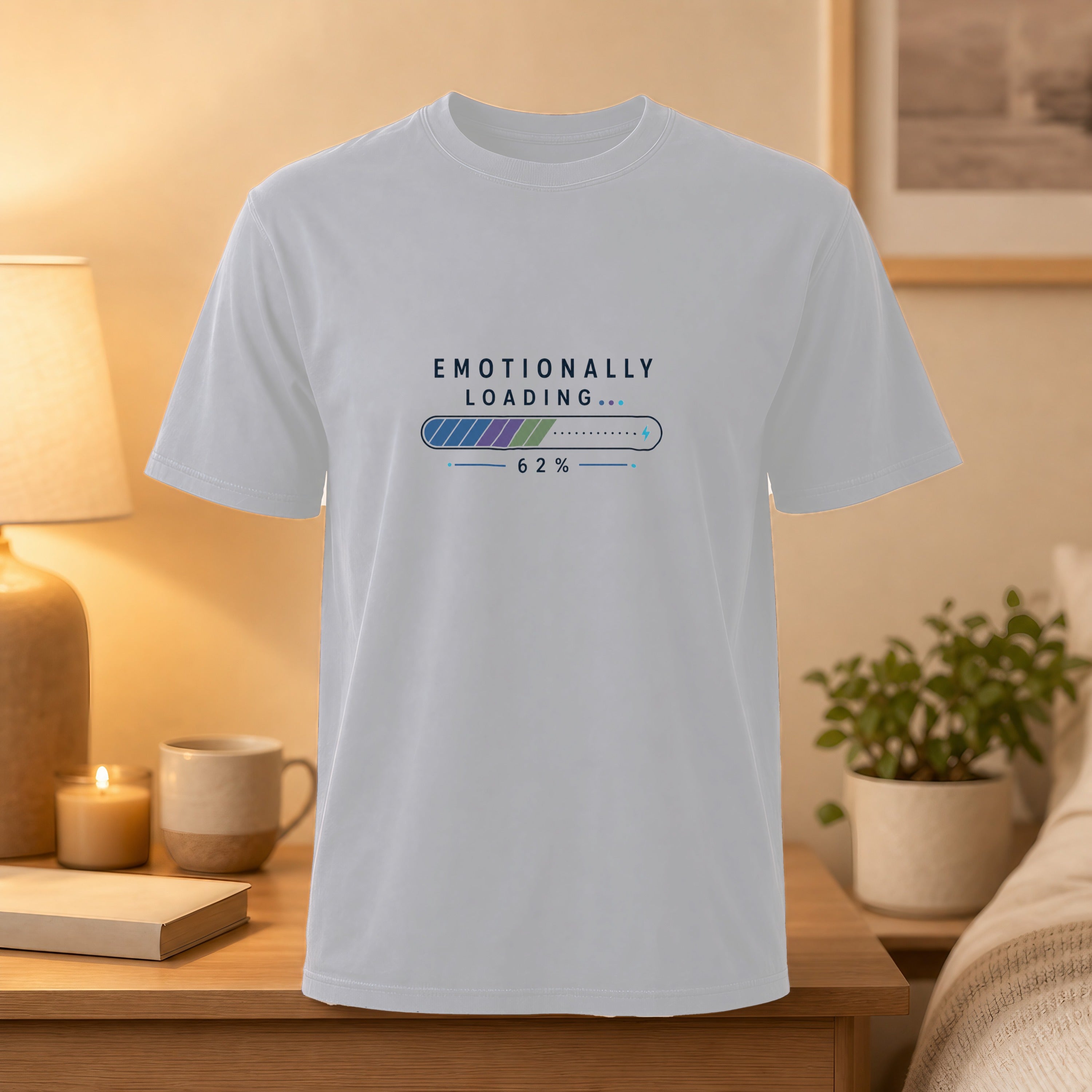 White t-shirt with "EMOTIONALLY LOADING... 62%" progress bar graphic.