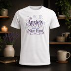 White t-shirt with "Anxiety With A Nice Font" and humorous text about overthinking.