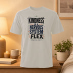 White t-shirt with text "Kindness is a Nervous System Flex."