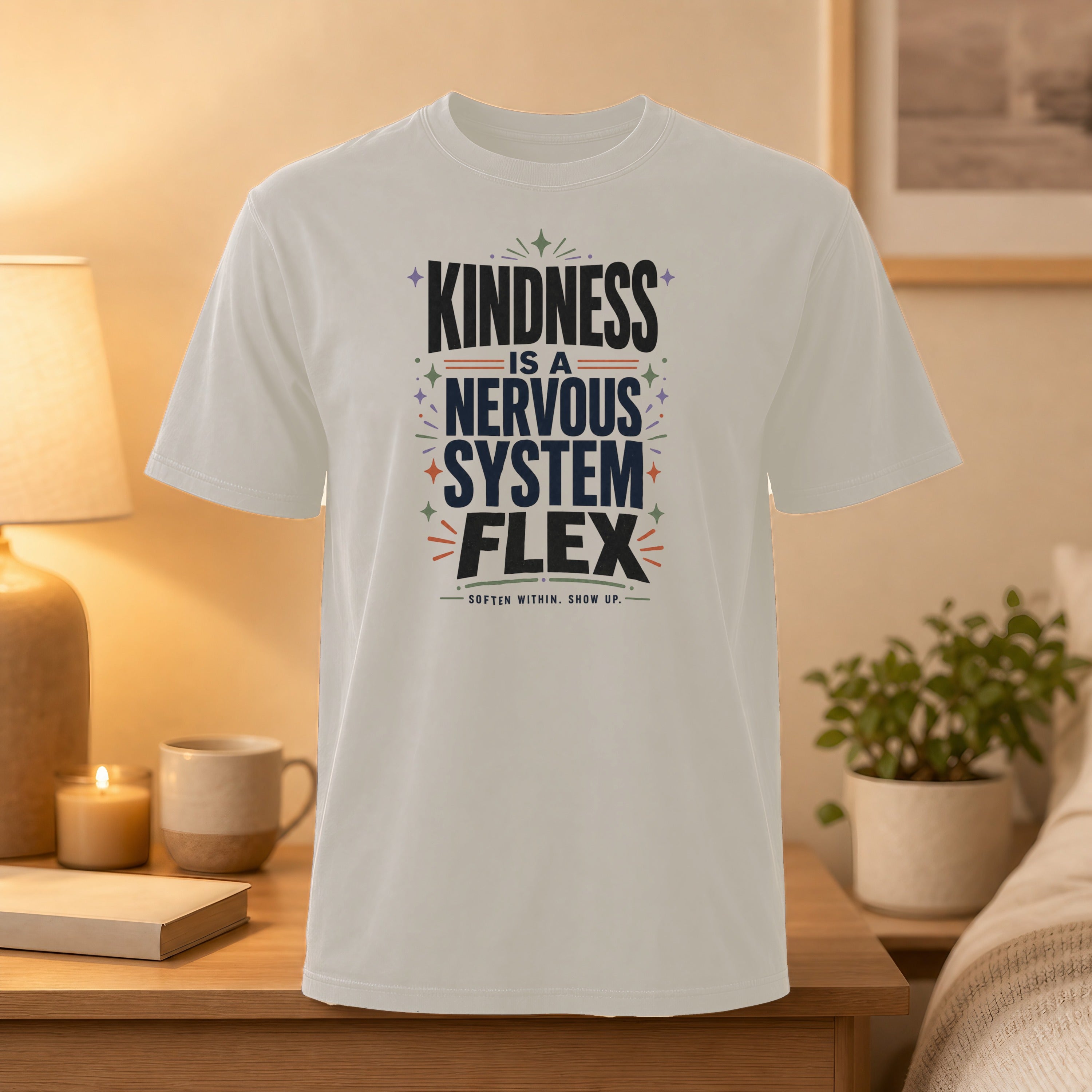 White t-shirt with text "Kindness is a Nervous System Flex."