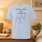 T-shirt with "HEALING IS NOT LINEAR" and growth stages graphic.