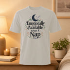 T-shirt with "Emotionally Available After A Nap" text and moon graphic.