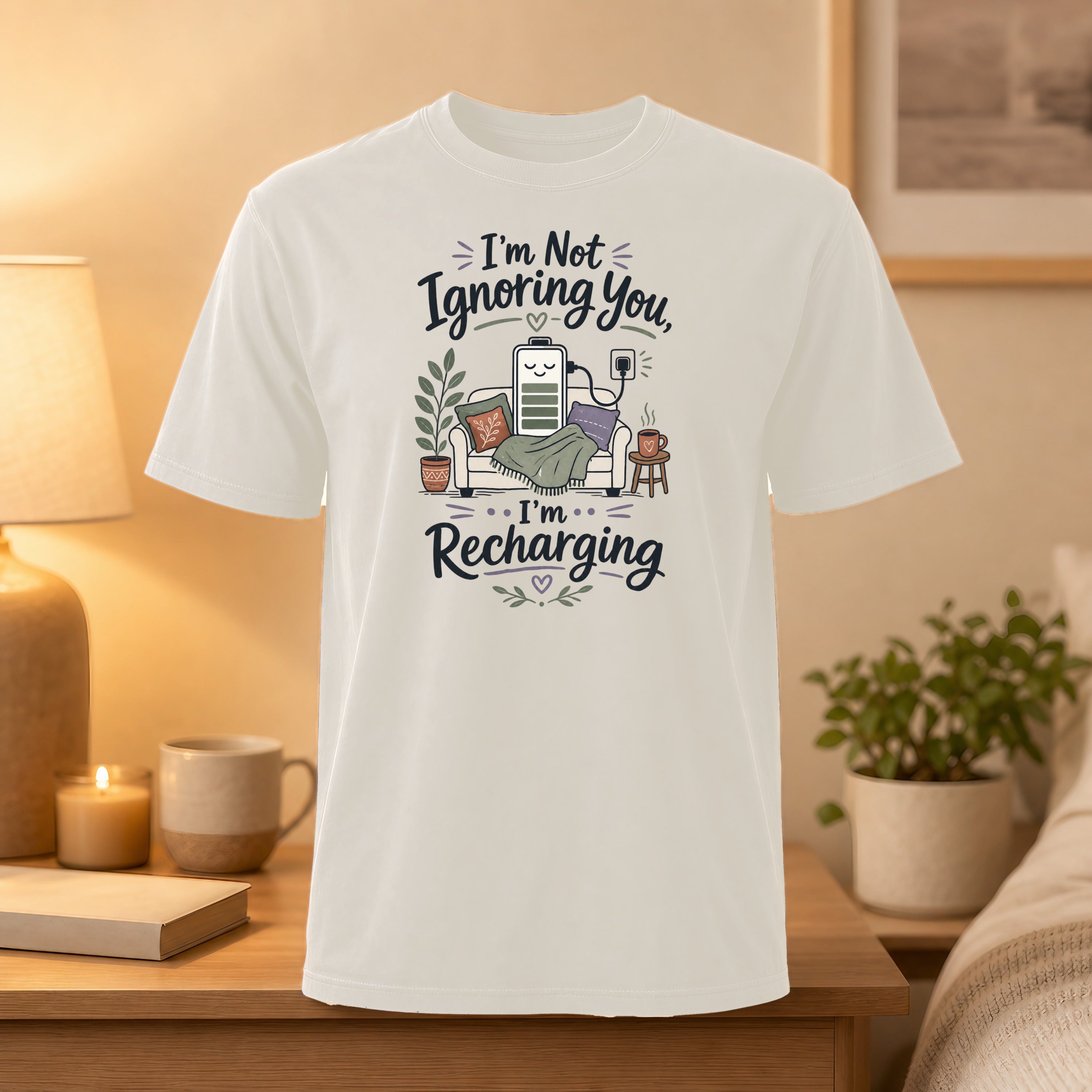 T-shirt with graphic of a charging battery and text "I'm Not Ignoring You, I'm Recharging."