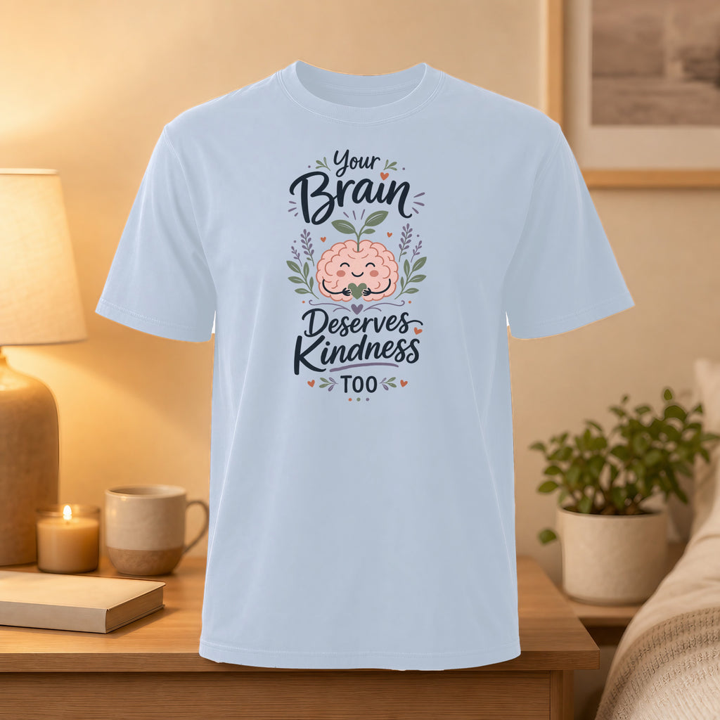 Light blue t-shirt with "Your Brain Deserves Kindness Too" text and brain graphic.