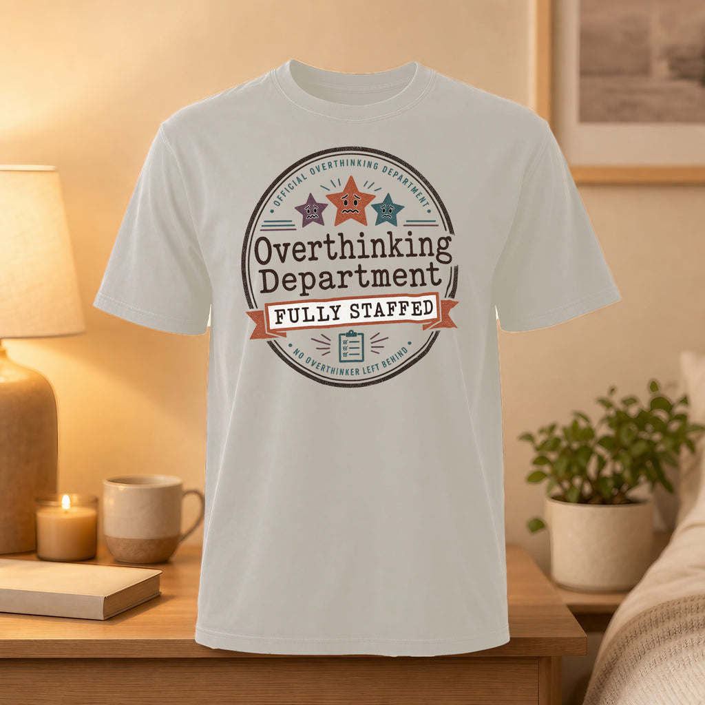 T-shirt with "Overthinking Department Fully Staffed" emblem.