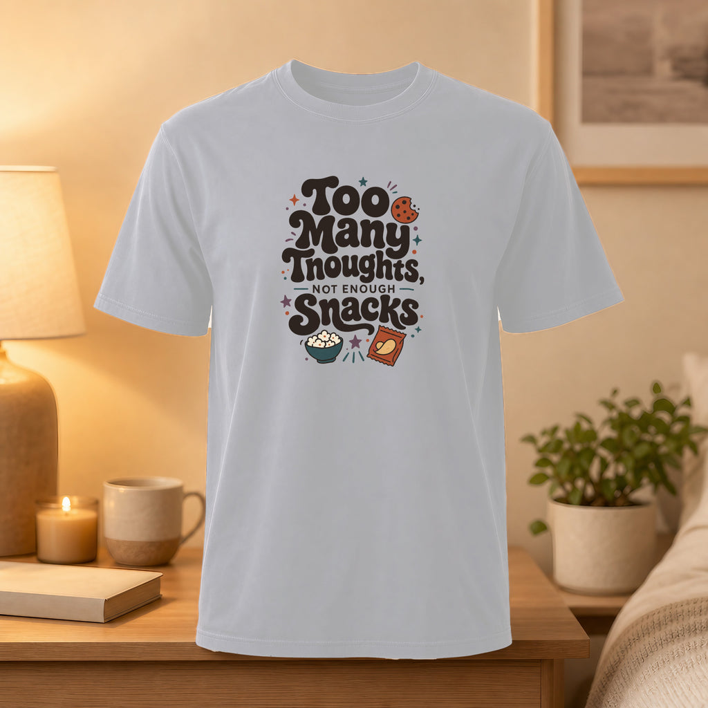 White t-shirt with "Too Many Thoughts, Not Enough Snacks" graphic.