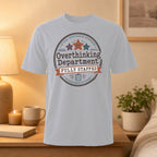 T-shirt with "Official Overthinking Department Fully Staffed" text and stars.