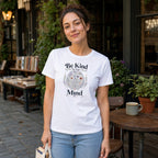 Woman wearing white t-shirt with "Be Kind To Your Mind" floral brain graphic.