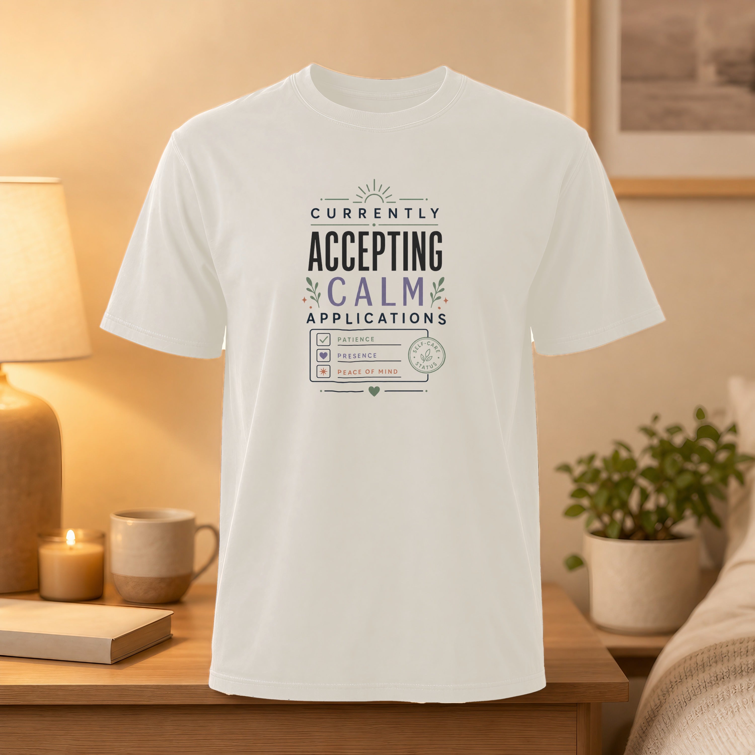 White t-shirt with "Currently Accepting Applications for Calm" graphic.