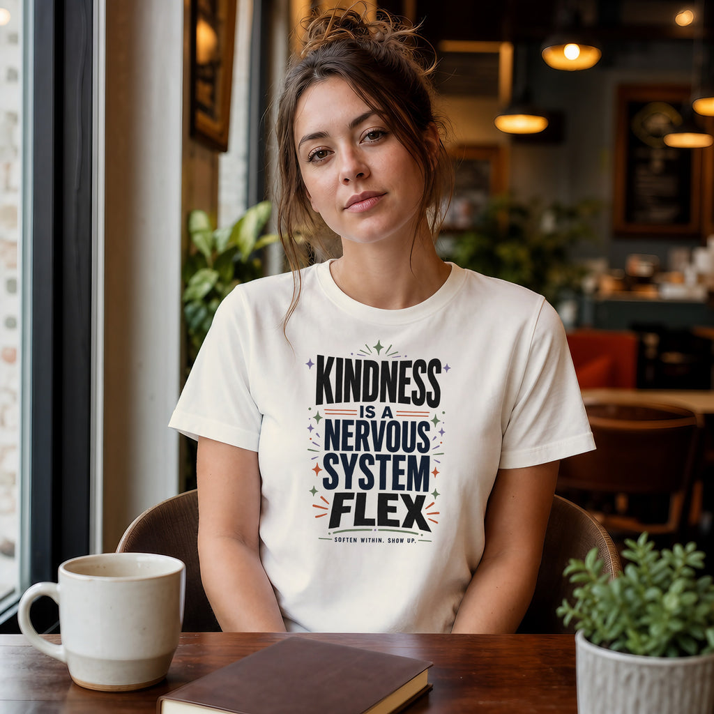 Woman wearing white t-shirt with "Kindness is a Nervous Flex" text.