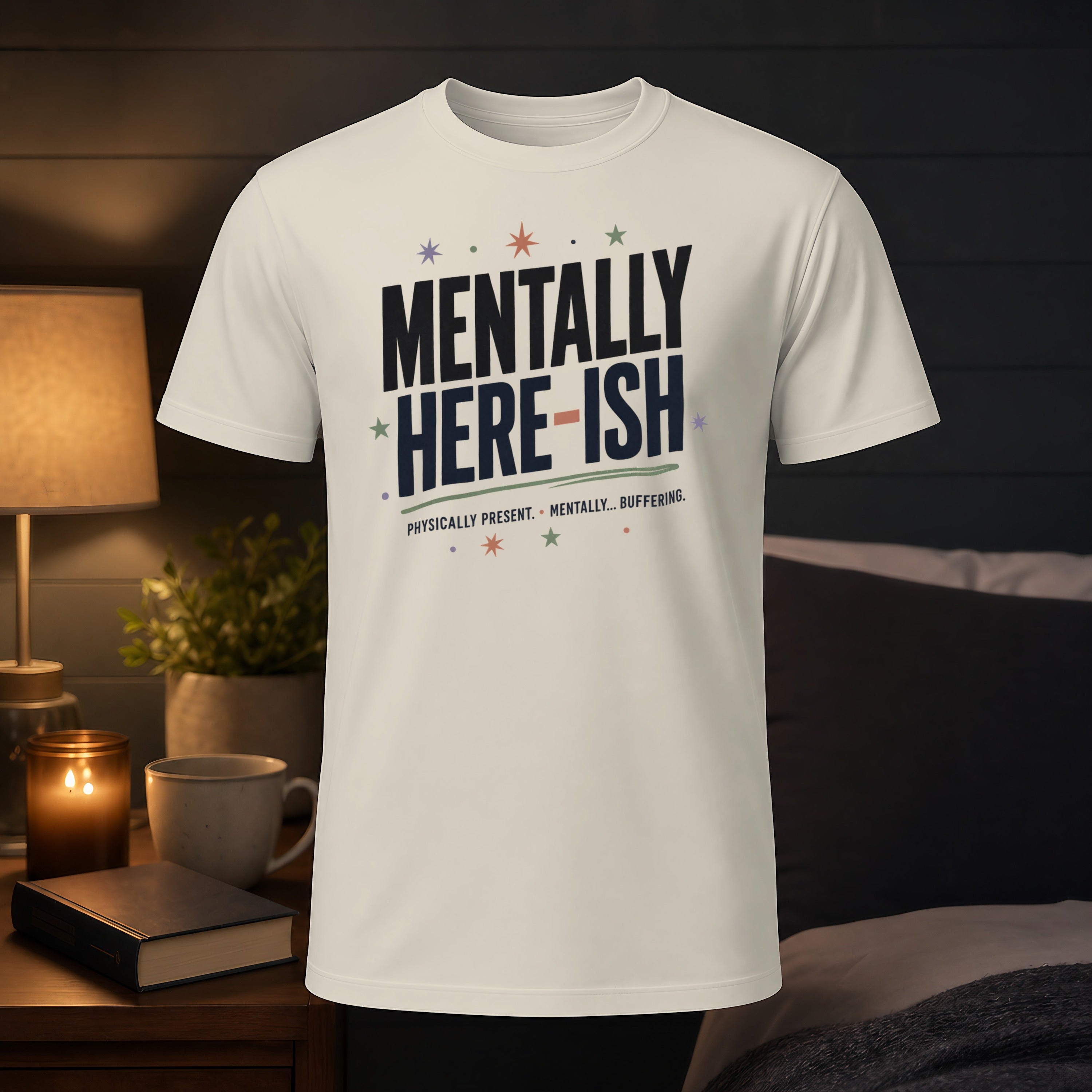 White t-shirt with "Mentally Here-ish" text and stars.