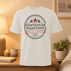 White t-shirt with "Official Overthinking Department Fully Staffed" circular graphic.