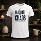 White t-shirt with "UNAVAILABLE FOR CHAOS" and "BOUNDARIES ARE PROTECTED."