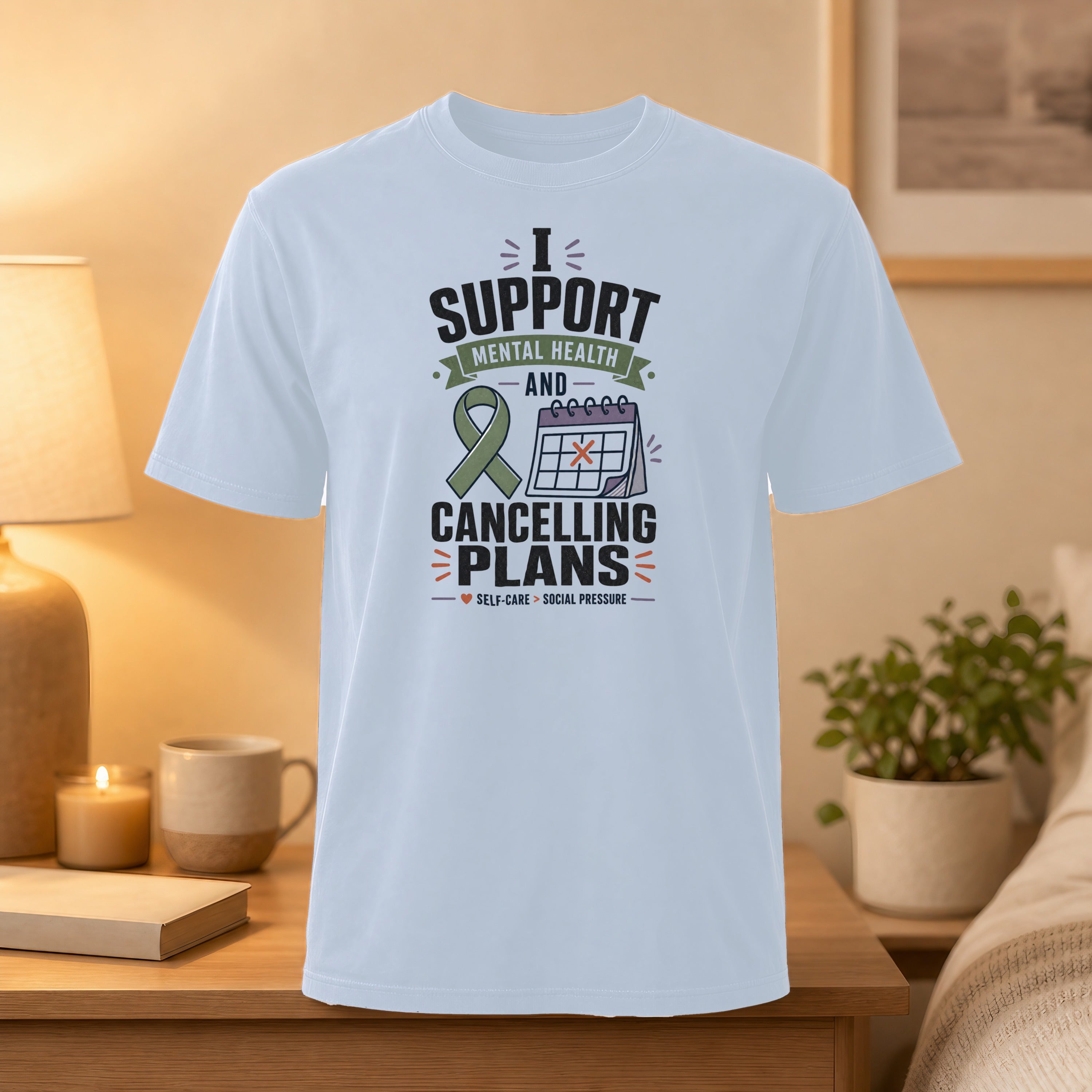 White t-shirt with "I Support Mental Health and Cancelling Plans" slogan.