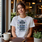 Woman wearing a white t-shirt with "MY BRAIN HAS TOO MANY TABS OPEN" text.