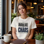 Woman wearing a white t-shirt with "UNAVAILABLE FOR CHAOS" text.