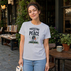 Woman wearing white t-shirt with "Protecting My Peace Like It Pays Rent" text.