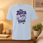 Light blue t-shirt with "My Aura Left The Chat" graphic and icons.