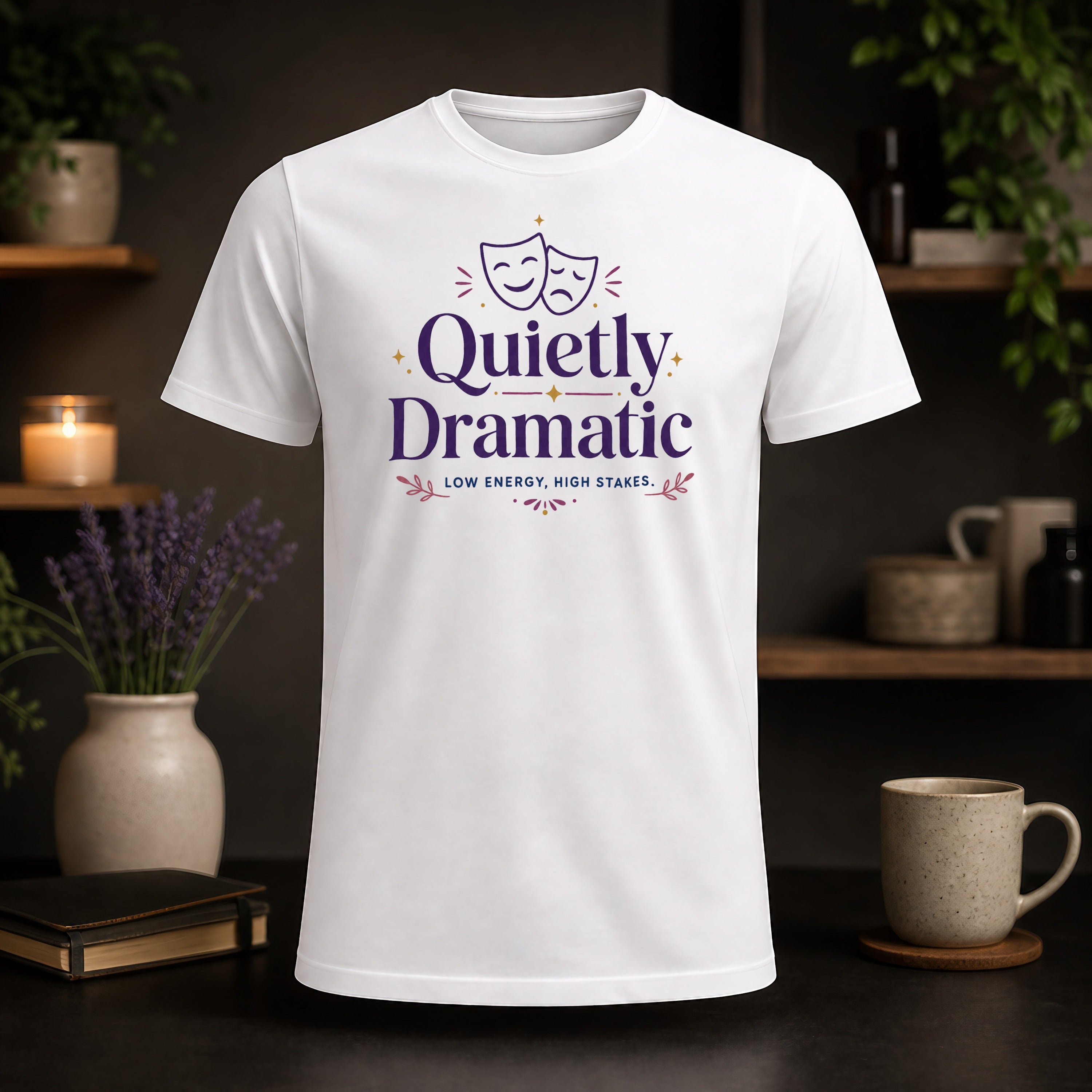 White t-shirt with "Quietly Dramatic" text and theatre masks.