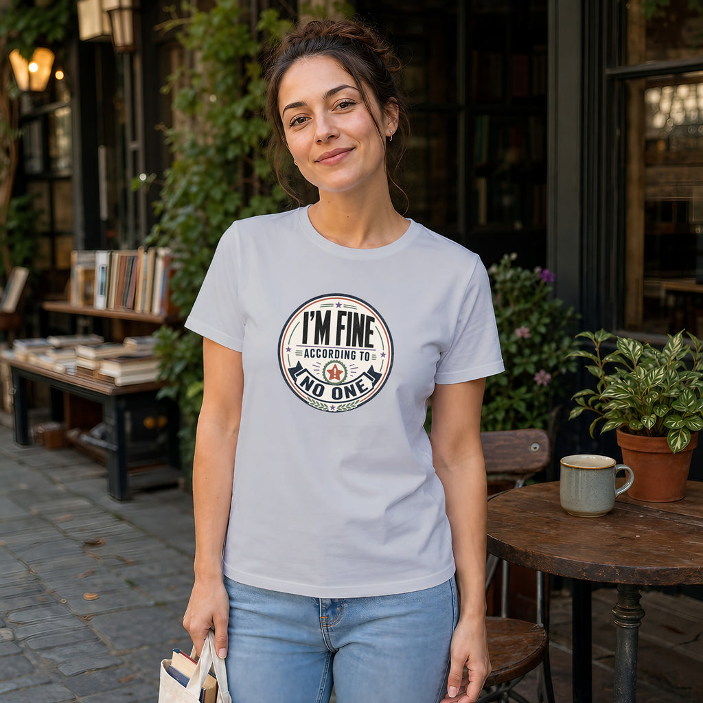 Woman wearing white t-shirt with "I'm Fine According to No One" graphic.