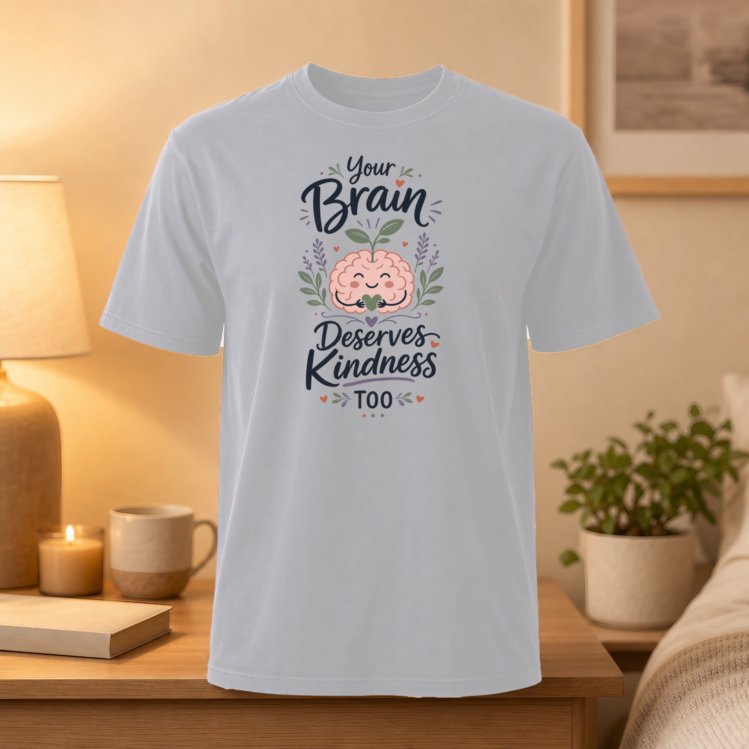 T-shirt with illustration of brain with leaves and text "Your brain deserves kindness too".